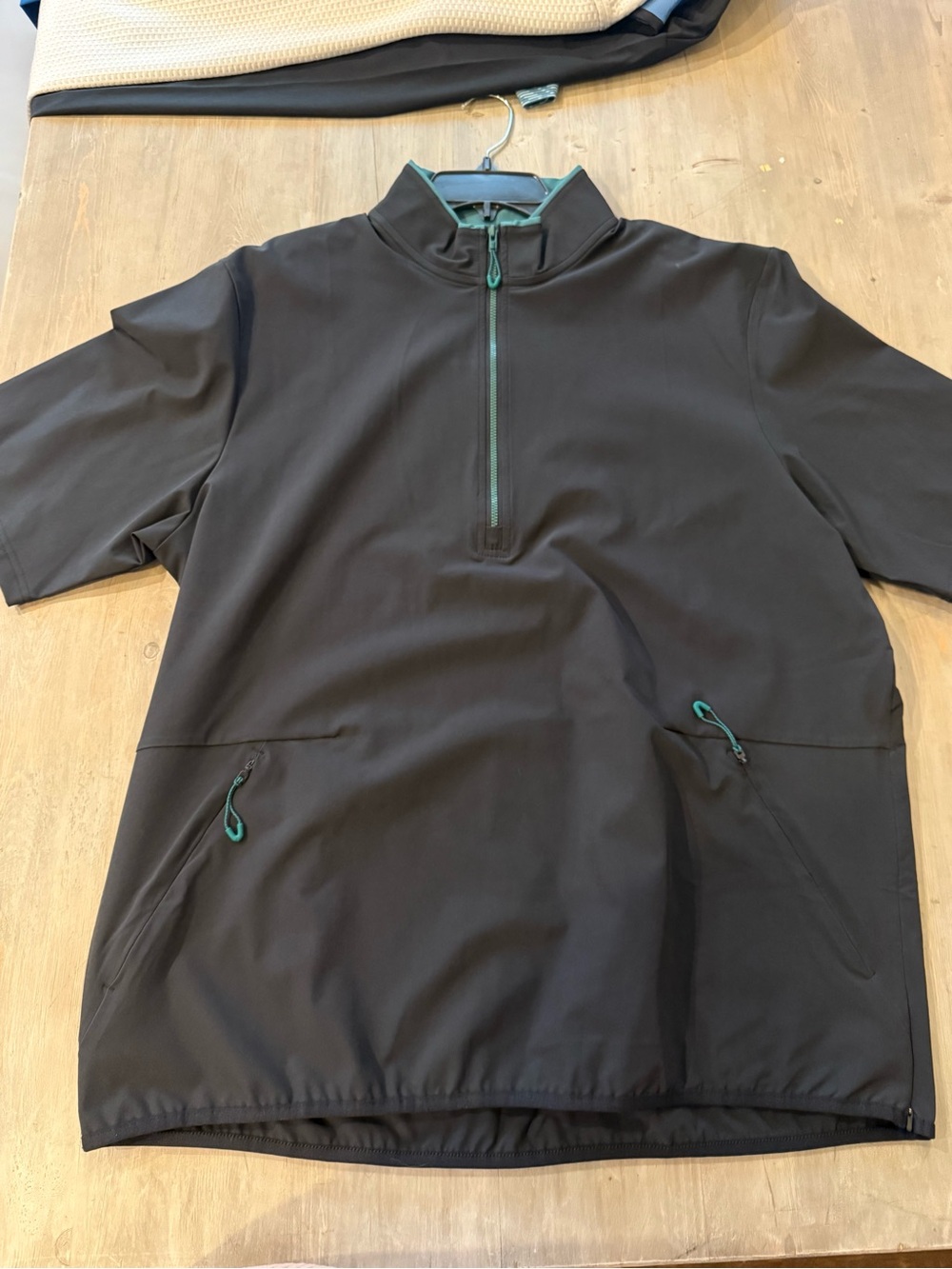 Under Armour Black Short-Sleeve Quarter-Zip Pullover with Teal Accents